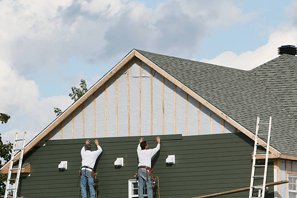 Professional Wood Siding technician working in Fairview, NJ